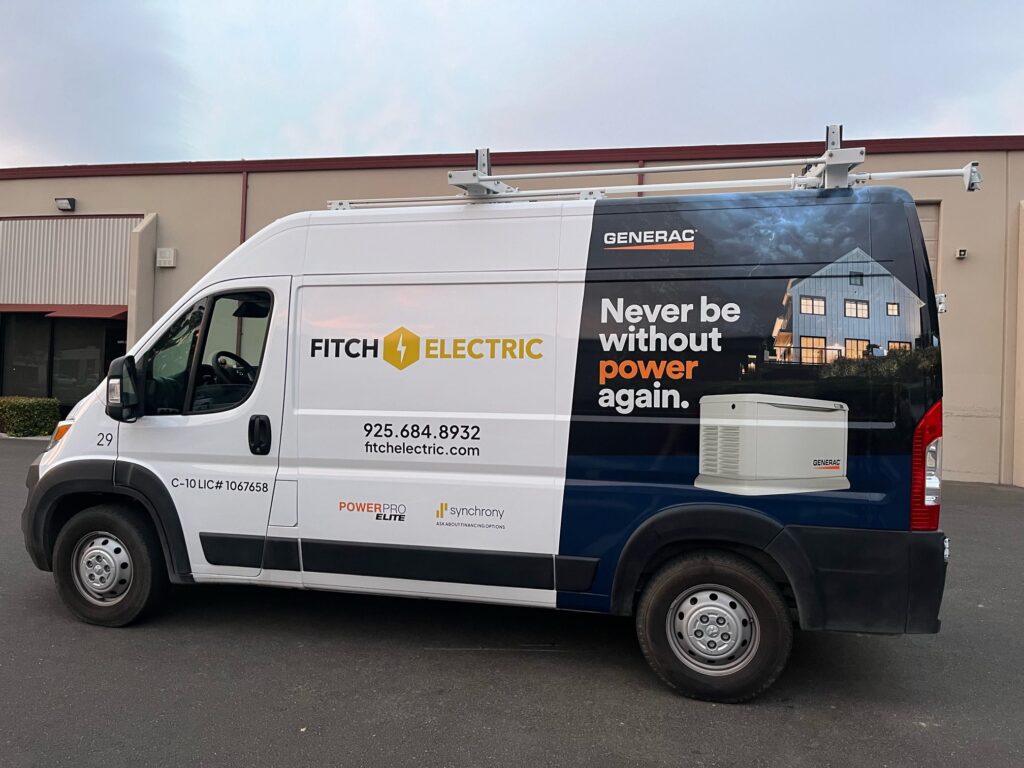 Partial graphic wrap installation on van.